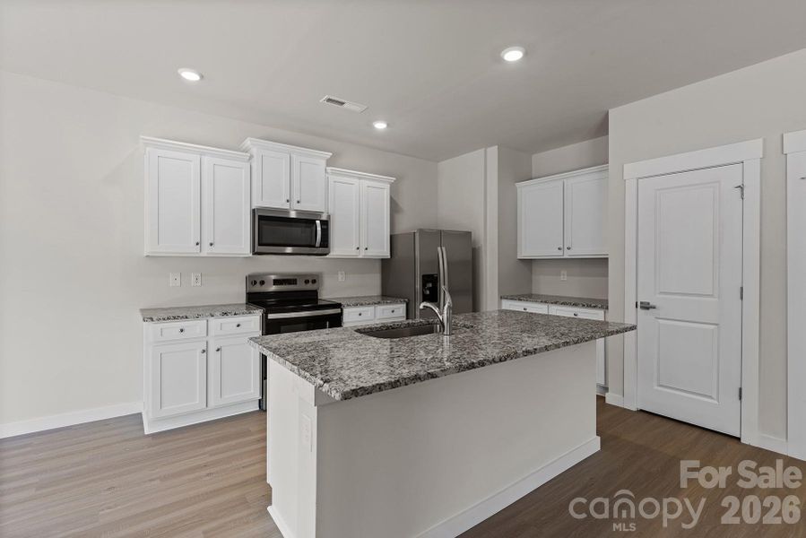 Furnished interior view inside a new home in Knights Bridge, Richburg (Image 6).