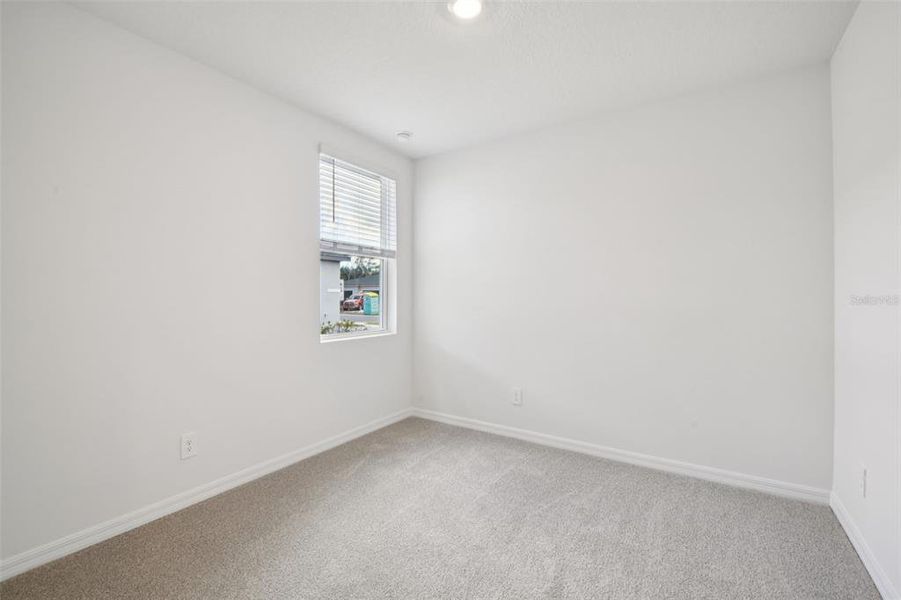 Spacious, unfurnished interior of a new home in Ridgehaven - Villas, Ormond Beach (Image 26).