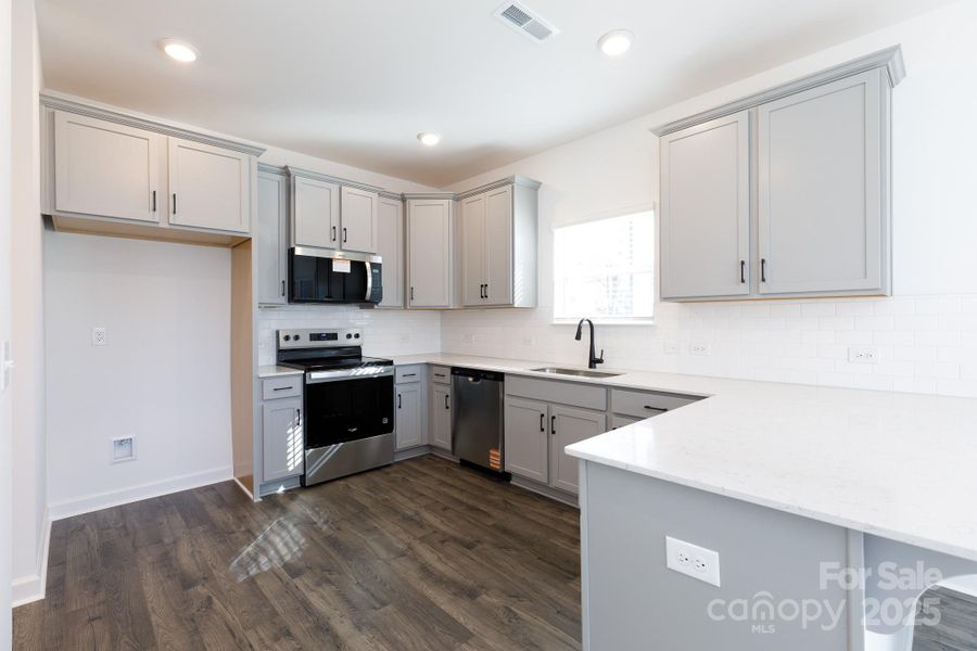 Furnished interior view inside a new home in , Charlotte (Image 14).