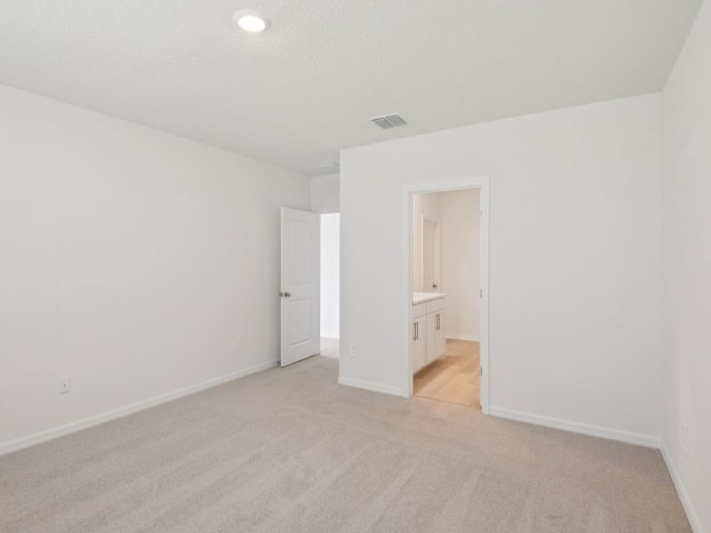 Spacious, unfurnished interior of a new home in The Grove at Stuart Crossing - Classic Series, Bartow (Image 11).