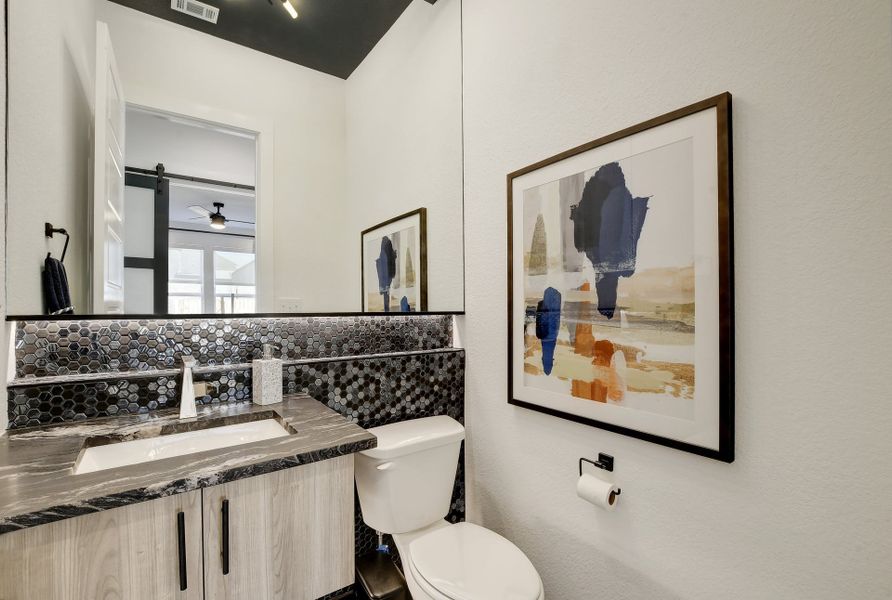 Representative furnished interior of a home built from the Jester by Scott Felder Homes in Prominence, San Antonio (Image 8).
