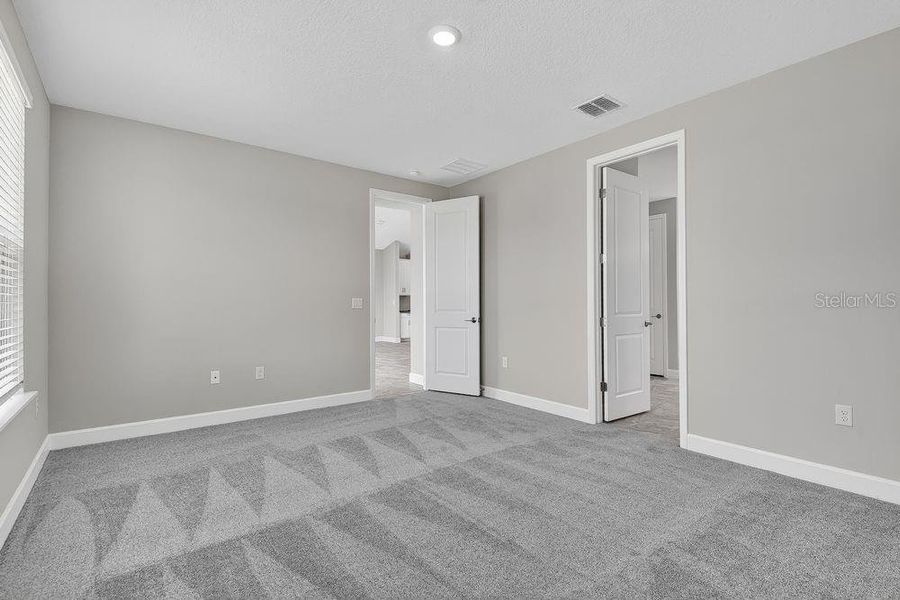 Spacious, unfurnished interior of a new home in Colbert Landings, Palm Coast (Image 15).
