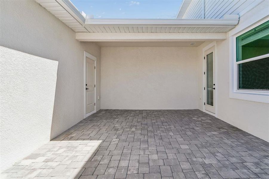Exterior details and patio area of a home in SeaFlower, Bradenton (Image 3).