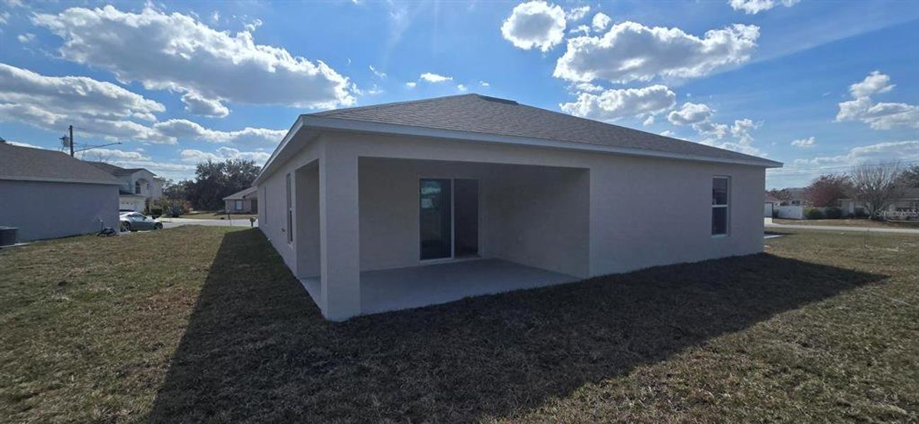 Exterior details and patio area of a home in Poinciana, Poinciana (Image 12).