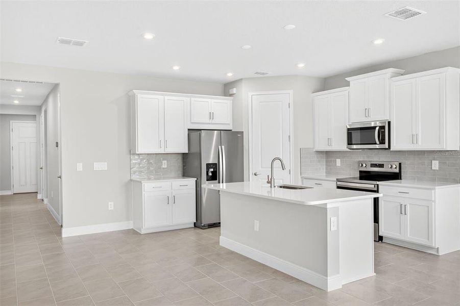 Furnished interior view inside a new home in Windwater, Parrish (Image 7).