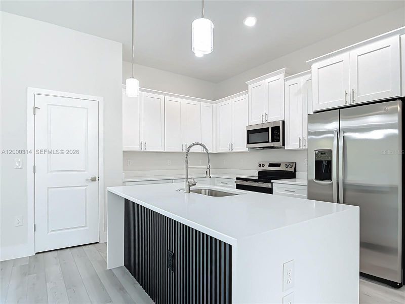 Furnished interior view inside a new home in , Port Charlotte (Image 7).