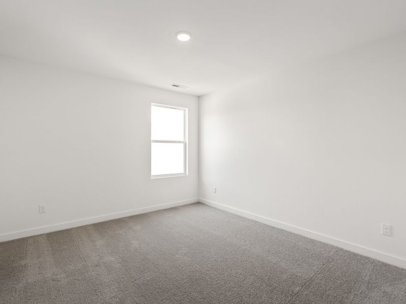 Spacious, unfurnished interior of a new home in Calista Farms, White House (Image 33).