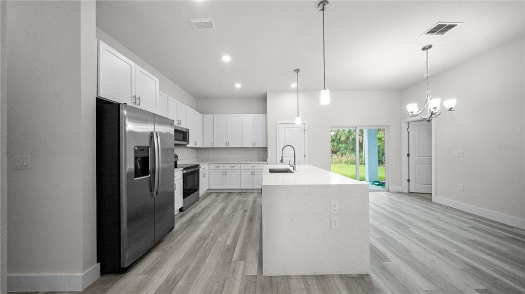 Furnished interior view inside a new home in , North Port (Image 13).