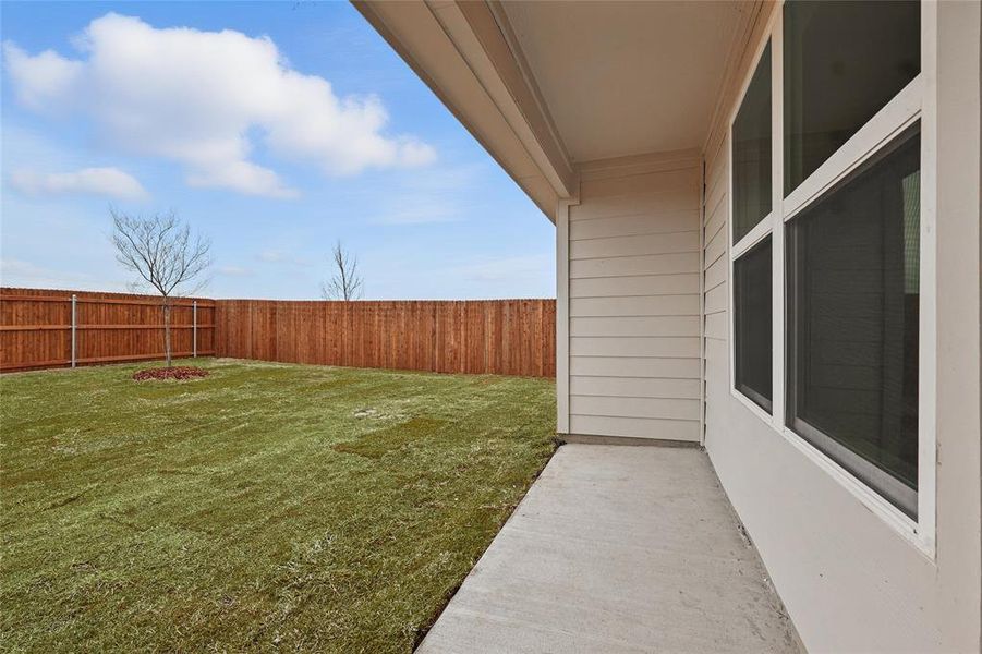 Fenced backyard with a patio Fenced backyard with a patio
