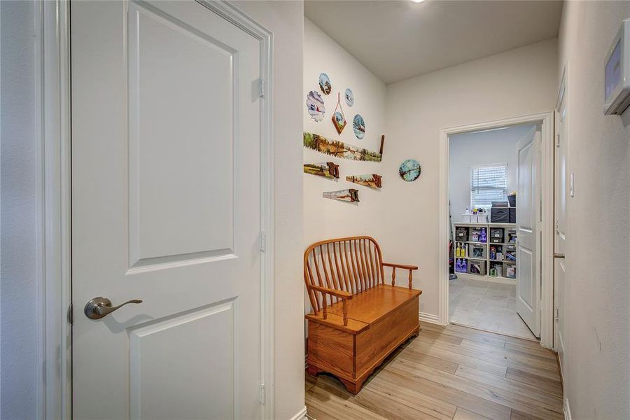 Hallway featuring light hardwood / wood-style flooring