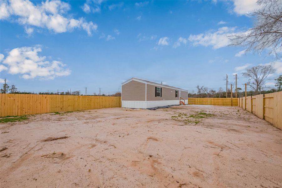 Front exterior of a new home in , Cleveland, TX, highlighting curb appeal (Image 2). Front exterior of a new home in , Cleveland, TX, highlighting curb appeal (Image 2).