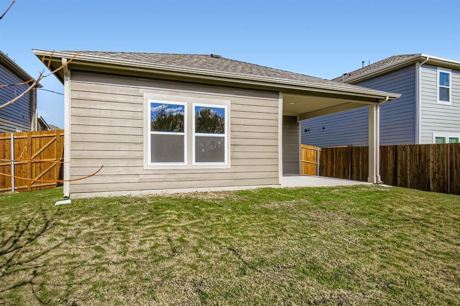 Exterior details and patio area of a home in Ambergrove, Royse City (Image 3).