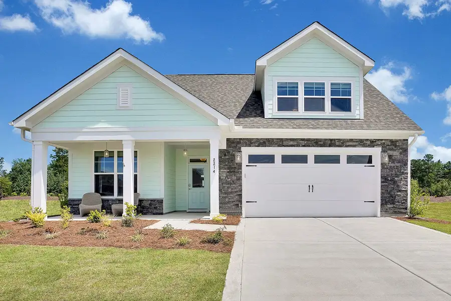 Representative exterior photo of a completed home built from the Promenade by McKee Homes in The Cottages at 78 North, Sanford, NC (Image 21).