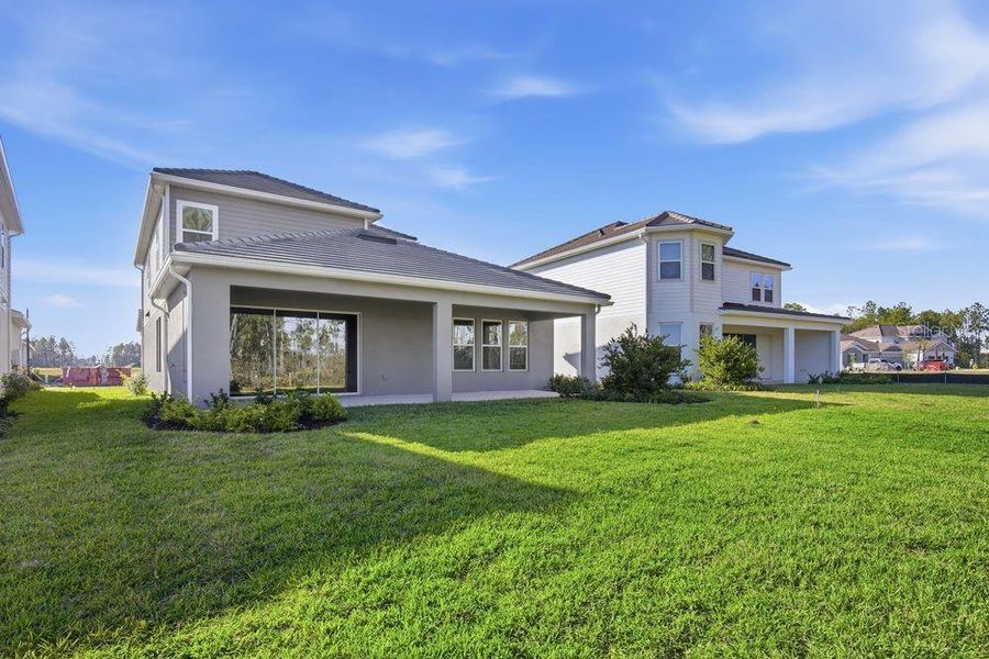 Exterior details and patio area of a home in Hammock at Two Rivers, Zephyrhills (Image 2). Exterior details and patio area of a home in Hammock at Two Rivers, Zephyrhills (Image 2).