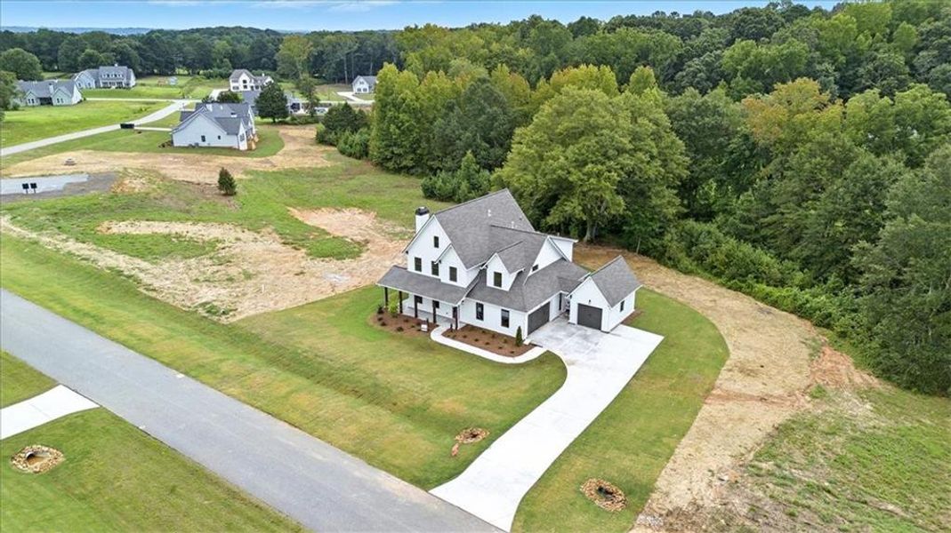 Front exterior of a new home in Old Town Estates, Monroe, GA, highlighting curb appeal (Image 30).