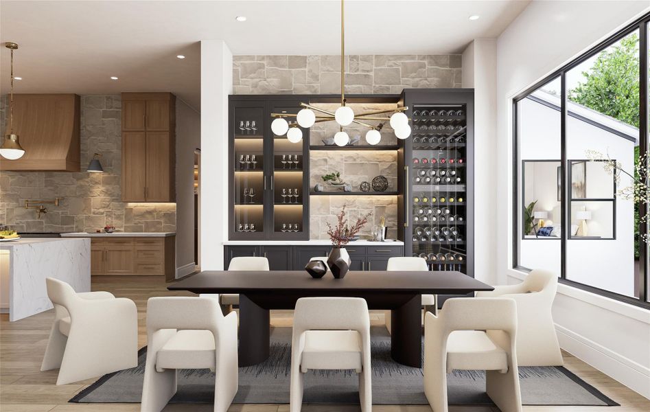 Thoughtful details take center stage in this sophisticated dining area. A floor-to-ceiling wine display and sleek bar cabinetry blend functionality with design flair. Layered lighting and natural textures highlight the home’s potential for stylish entertaining, while the open layout invites connection across spaces.