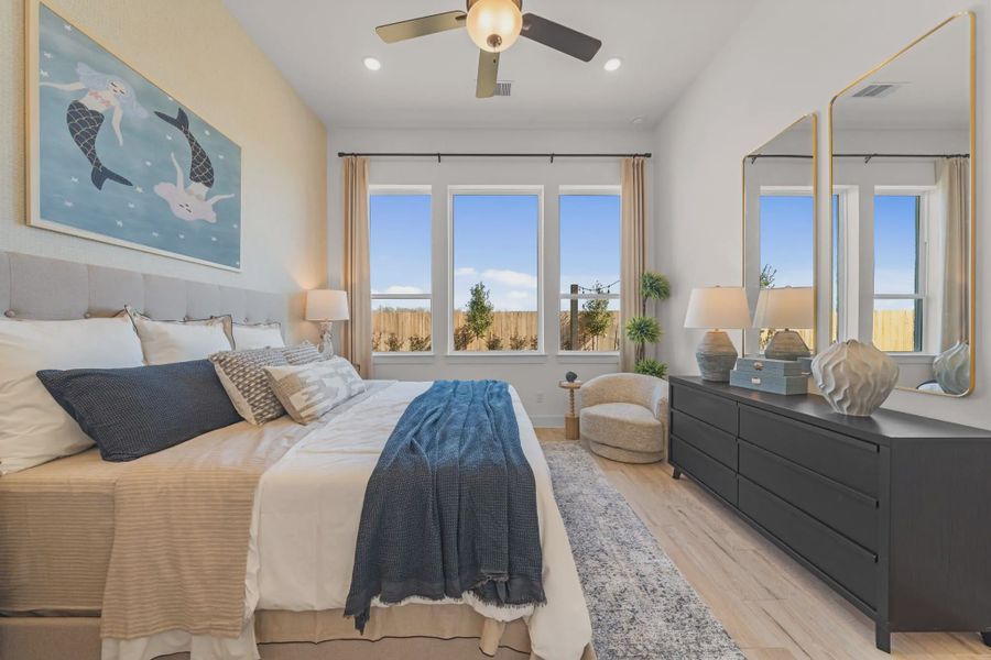 Representative furnished interior of a home built from the Hampton by Chesmar Homes in Meridiana 50's and 60's, Manvel (Image 49).