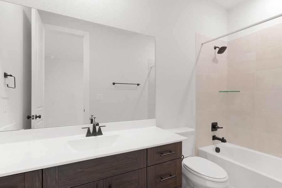 Furnished interior view inside a new home in The Grove at Blackhawk, Pflugerville (Image 19). Furnished interior view inside a new home in The Grove at Blackhawk, Pflugerville (Image 19).