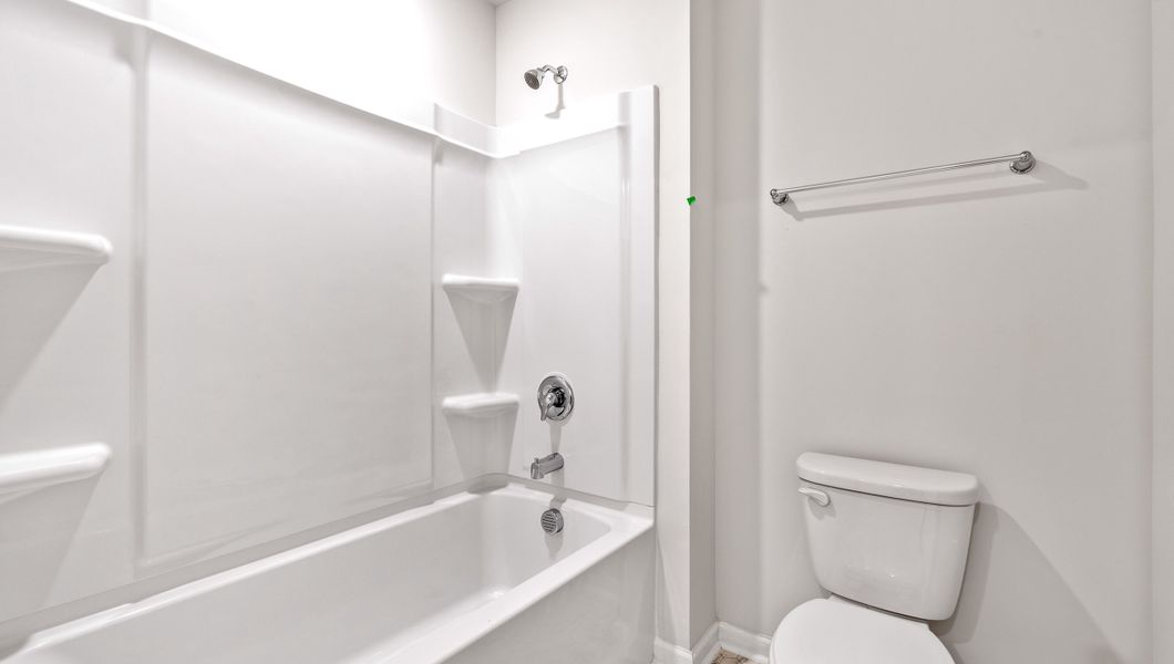 Furnished interior view inside a new home in Lakestone, Woodruff (Image 14).