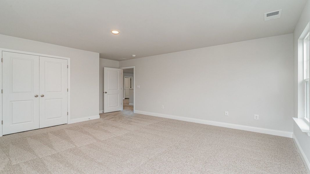 Representative unfurnished interior of a home built from the Westerly by D.R. Horton in Shell Pointe, Gilbert (Image 31).