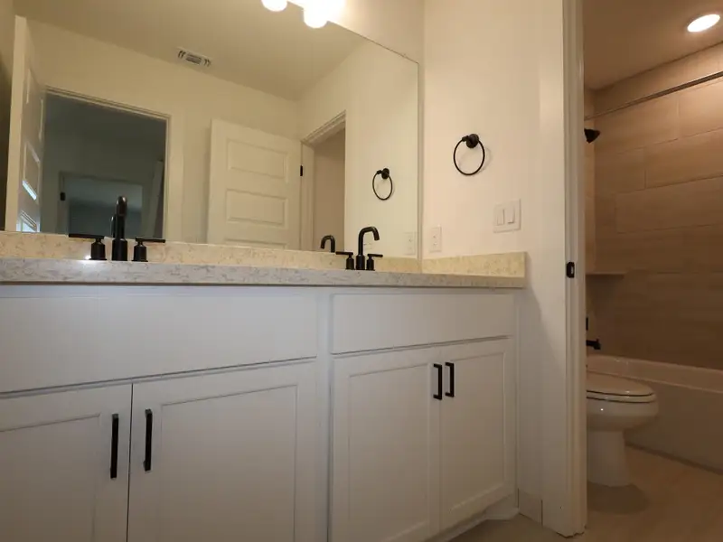 Furnished interior view inside a new home in Barksdale, Leander (Image 6). Furnished interior view inside a new home in Barksdale, Leander (Image 6).