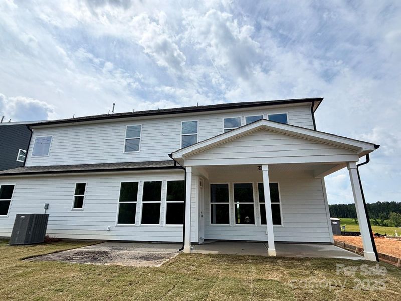 Front exterior of a new home in , Sherrills Ford, NC, highlighting curb appeal (Image 14).
