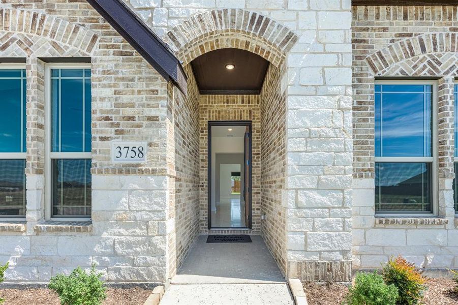 Front exterior of a new home in Georgetown at Kings Fort 60s, Kaufman, TX, highlighting curb appeal (Image 22). Front exterior of a new home in Georgetown at Kings Fort 60s, Kaufman, TX, highlighting curb appeal (Image 22).