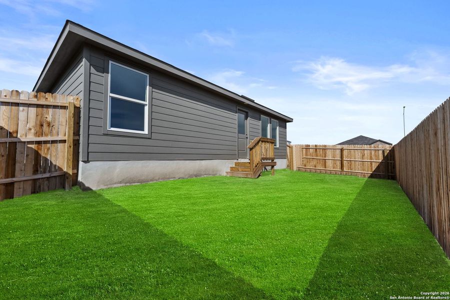 Exterior details and patio area of a home in Voss Farms: Watermill Collection, New Braunfels (Image 2).