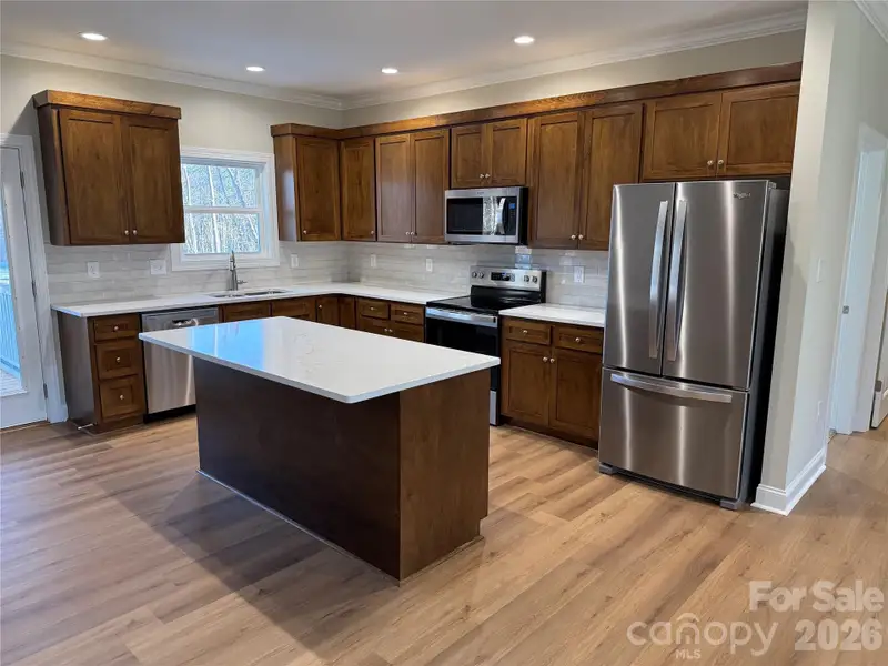 Furnished interior view inside a new home in , Statesville (Image 3).