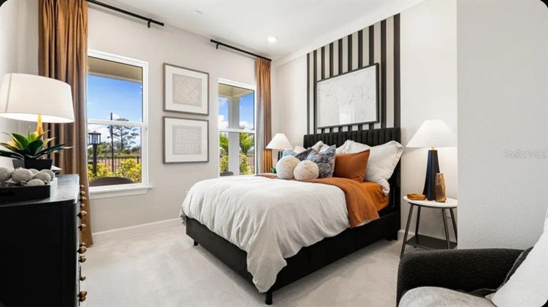 Furnished interior view inside a new home in Esplanade at McKinnon Groves, Winter Garden (Image 5).