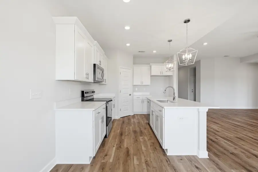 Furnished interior view inside a new home in McCarthy Estates, Defuniak Springs (Image 11).