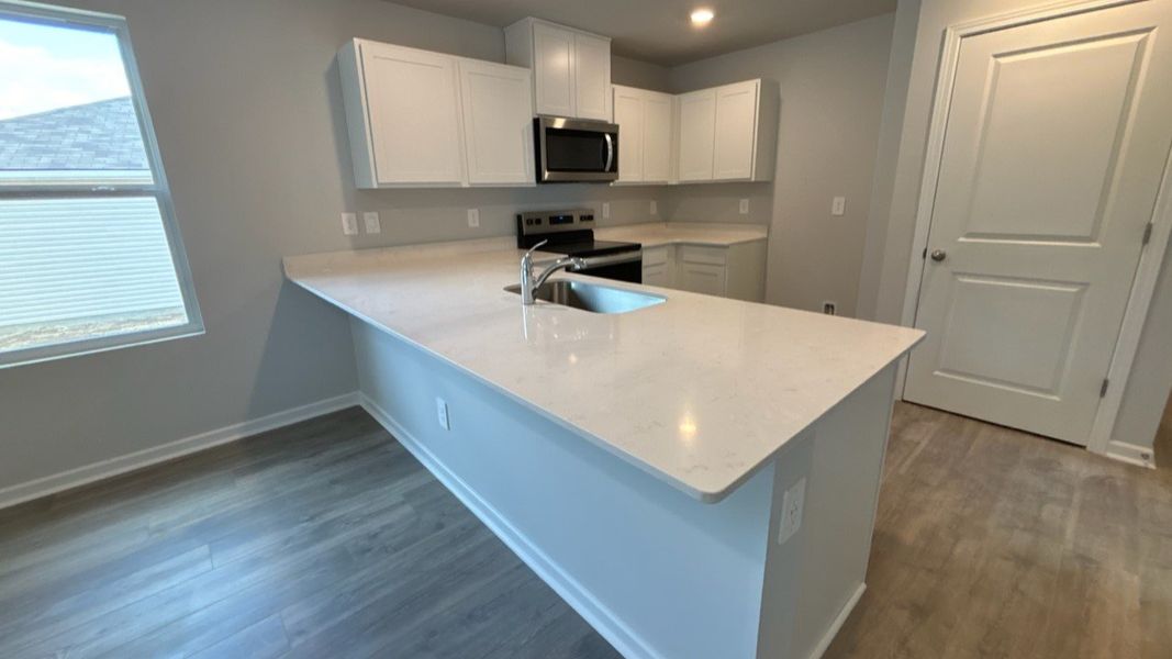 Furnished interior view inside a new home in Saddle Trace, Lewisburg (Image 7).