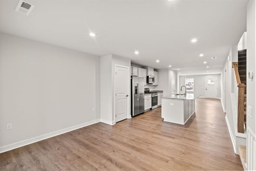 Spacious, unfurnished interior of a new home in Lakes at Riverbend Townhomes, Navassa (Image 14).
