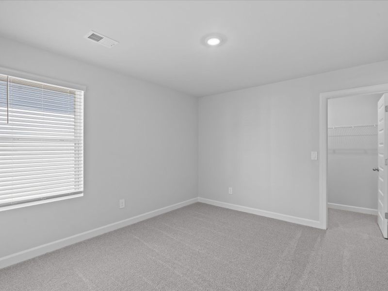 Spacious, unfurnished interior of a new home in The Farm at Wells Creek - Signature Collection, Gray Court (Image 20).