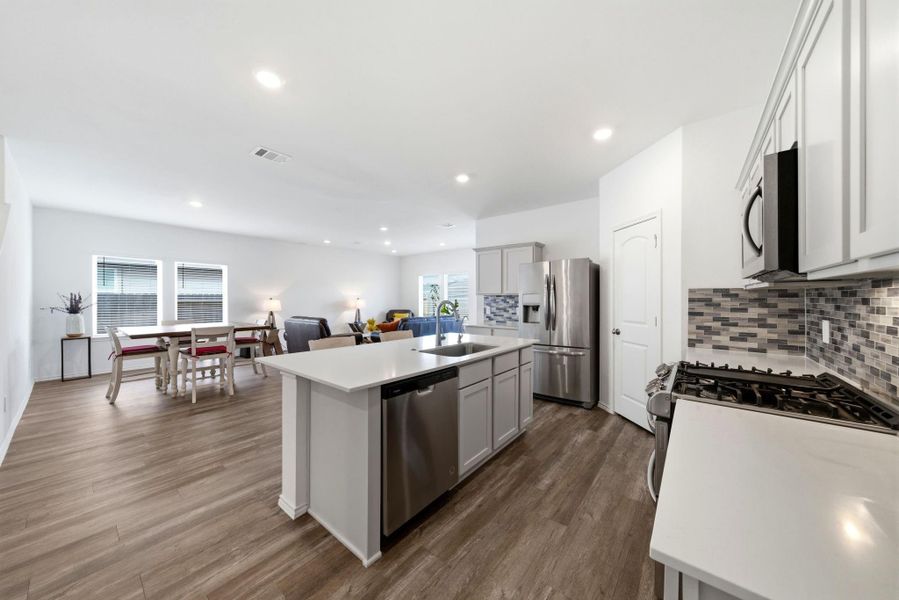 Open floor plan + expansive kitchen—where room to cook, gather, and create memories meets modern design.