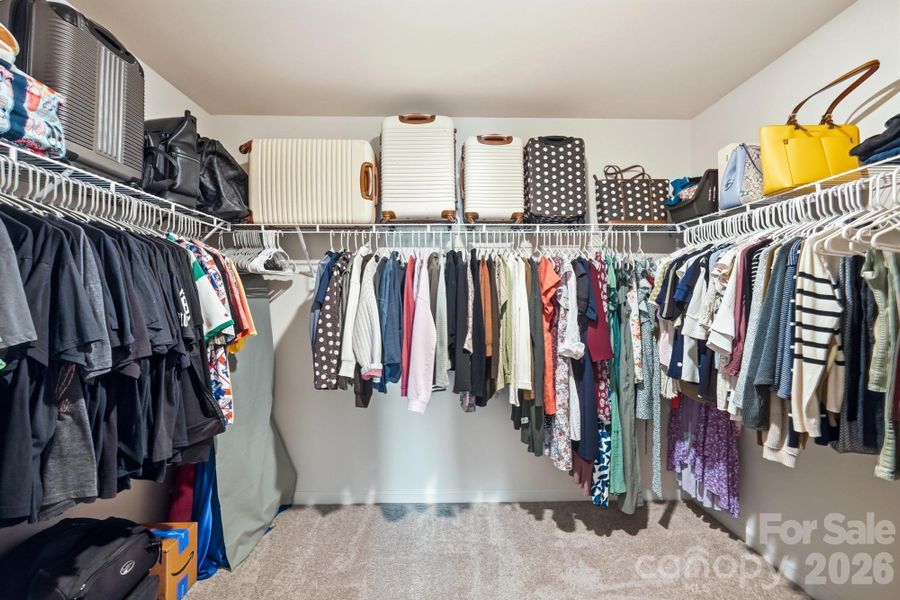 A dream-sized walk-in closet with space for every season. A dream-sized walk-in closet with space for every season.