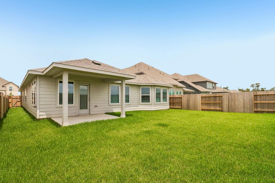Exterior details and patio area of a home in Riviera Pines - Classic Series, Huffman (Image 3). Exterior details and patio area of a home in Riviera Pines - Classic Series, Huffman (Image 3).
