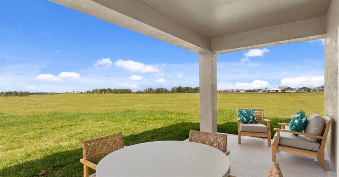 Exterior details and patio area of a home in Oakfield Trails, Parrish (Image 3).
