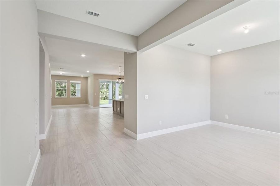 Spacious, unfurnished interior of a new home in Legends Preserve - Signature Series, Daytona Beach (Image 20).