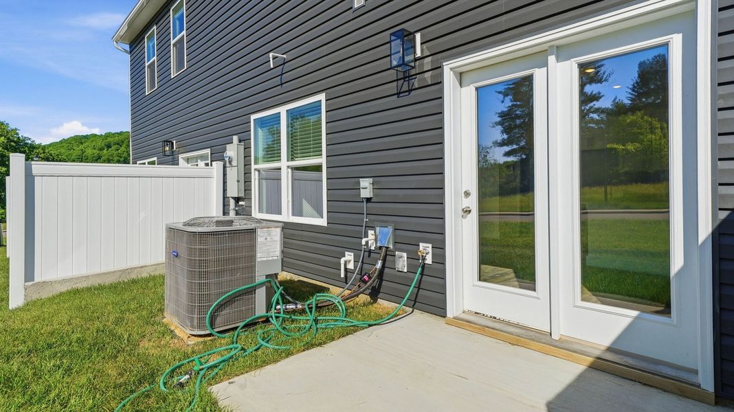 Exterior details and patio area of a home in The Arbor Townhomes, Kingsport (Image 16). Exterior details and patio area of a home in The Arbor Townhomes, Kingsport (Image 16).
