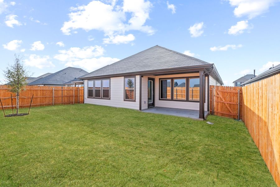 Exterior details and patio area of a home in Prairie Winds, Hutto (Image 4).
