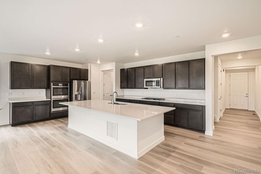 Furnished interior view inside a new home in Sunset Village: The Grand Collection, Erie (Image 4). Furnished interior view inside a new home in Sunset Village: The Grand Collection, Erie (Image 4).