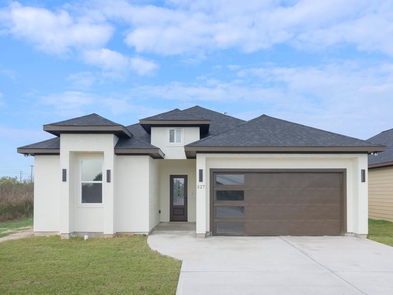 Front exterior of a new home in , Cleveland, TX, highlighting curb appeal (Image 24). Front exterior of a new home in , Cleveland, TX, highlighting curb appeal (Image 24).