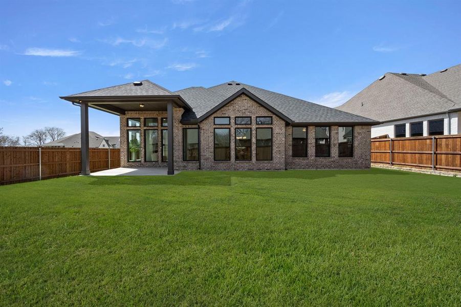 Exterior details and patio area of a home in Redden Farms - Phase 1, Midlothian (Image 25). Exterior details and patio area of a home in Redden Farms - Phase 1, Midlothian (Image 25).