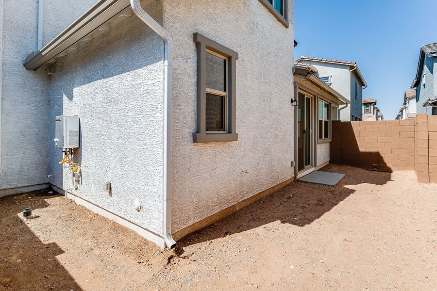 Front exterior of a new home in Avila at Rancho Mercado, Surprise, AZ, highlighting curb appeal (Image 21). Front exterior of a new home in Avila at Rancho Mercado, Surprise, AZ, highlighting curb appeal (Image 21).