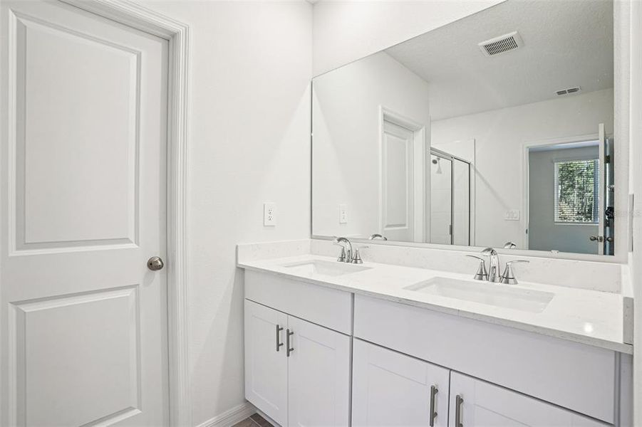 Furnished interior view inside a new home in Ridgehaven - Villas, Ormond Beach (Image 9).