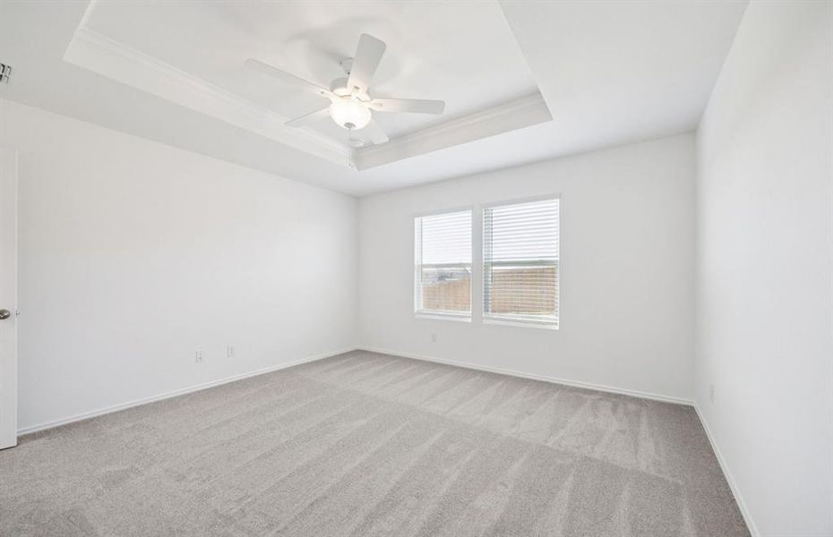 Spacious owner's suite highlighted by large windows and an exquisite tray ceiling Spacious owner's suite highlighted by large windows and an exquisite tray ceiling