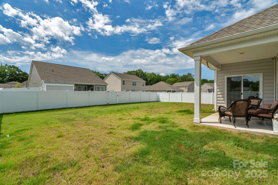 Front exterior of a new home in Crossroads, Locust, NC, highlighting curb appeal (Image 1). Front exterior of a new home in Crossroads, Locust, NC, highlighting curb appeal (Image 1).