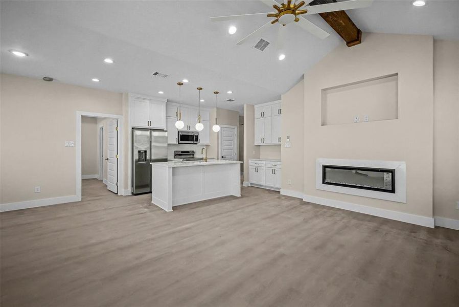 Living room with built in electric fireplace