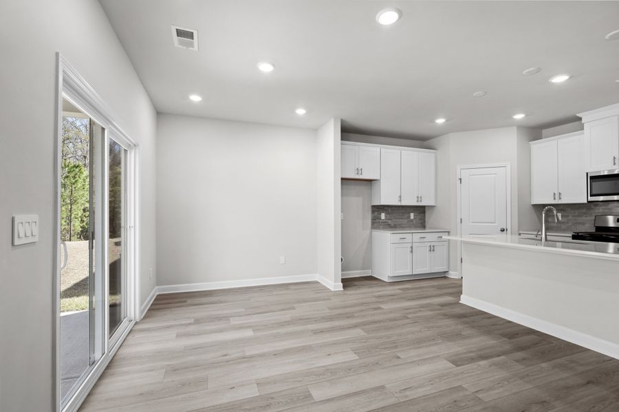 Spacious, unfurnished interior of a new home in Waterside - Coastline Series, Longs (Image 17).